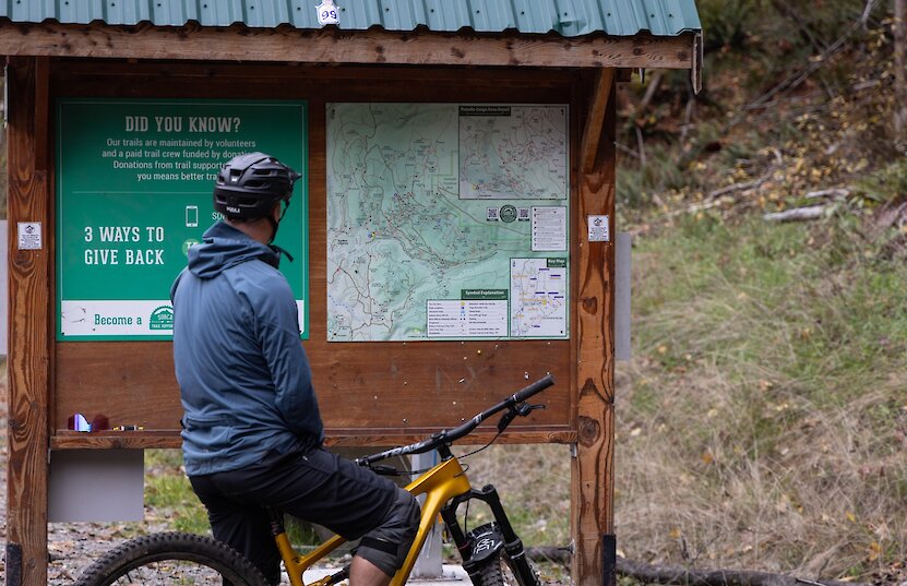 Group of mountain bikers admiring mountain view in Squamish